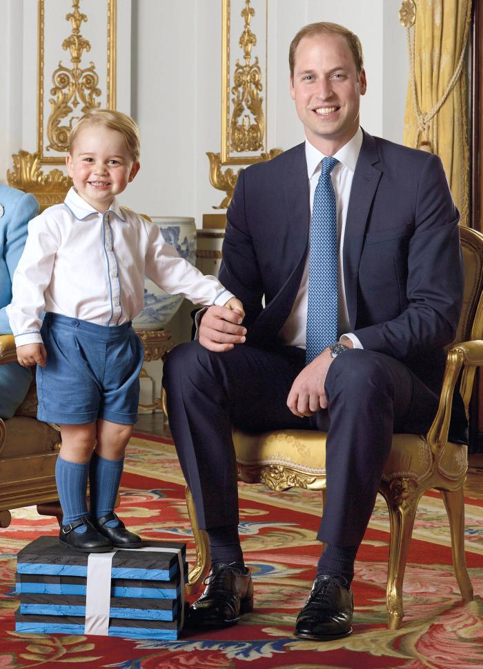 Prințul George, alături de tatăl său, William